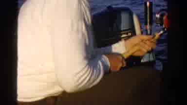 Ontario Canada (1958): Man Fishing Out Of A Small Motor Boat In Open Water