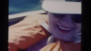 Ontario Canada (1958): A Close Up View Of A Woman Riding On Some Of Vehicle Who Is