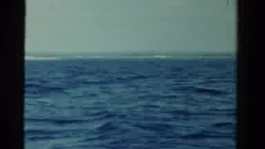 Ontario Canada (1958): View Of Boats Sitting In Ocean While Person Pulls In