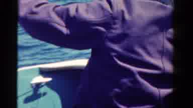 Ontario Canada (1958): Man On A Boat Getting A Fishing Line Out To Fish