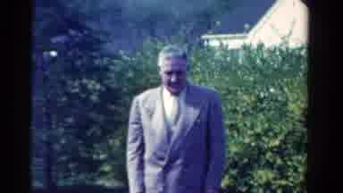 Ontario Canada (1958): Man Looks Down And Cuts To A Woman In Purple Dress Weeding