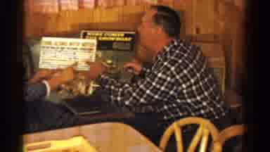 Ontario Canada (1958): Two People Discussing Who Has The Better Book To Read