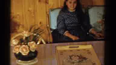 Ontario Canada (1958): A Child Is Playing In The Garden With His Mother