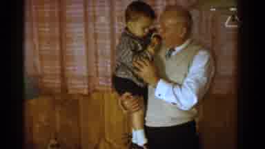 Ontario Canada (1958): Old Man Holding Young Boy With Another Young Boy Reaching