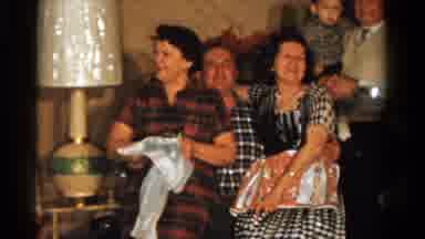 Ontario Canada (1958): Large Family Reuniting In Living Room With Women Drying The