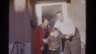 Ontario Canada (1958): A Man And Woman Pose With A Young Boy On A Front Porch