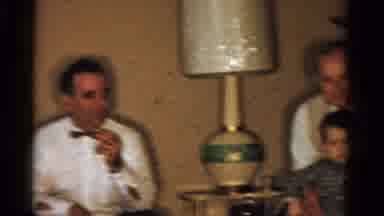 Ontario Canada (1958): Family Is All Gathered Around And The Grandpa Is Bouncing