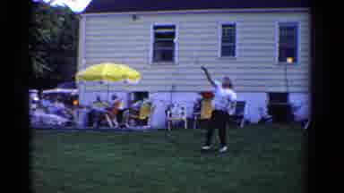 Ontario Canada (1958): People In A Backyard Playing Badminton Without A Net