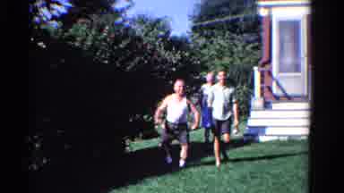 Ontario Canada (1958): Three Men Walking On The Yard Of A House Cheerfully