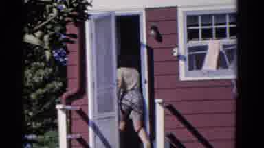 Ontario Canada (1958): Teenager Goes Back Inside His Home From The Backyard While