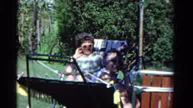 Ontario Canada (1958): Man And Woman Camping Sitting Down Making A Fire In The