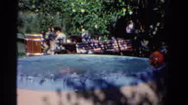Ontario Canada (1958): Woman In Above Ground Pool Fully Immerses Herself And