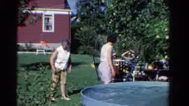 Ontario Canada (1958): The Family Members Are Enjoyed In The Garden