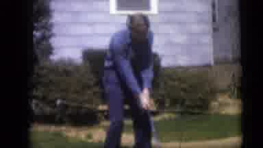 Camden New Jersey USA (1959): Man In His Yard Getting Ready To Swing At Golf Ball