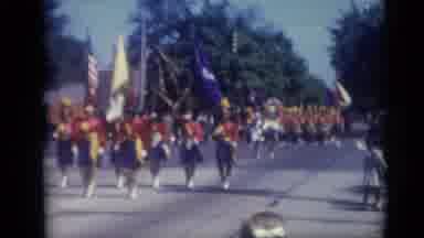 Camden New Jersey USA (1959): Marching Band Coming Down The Street With American