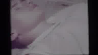 Camden New Jersey USA (1959): A Short Hair Girl Wearing A Plaid Skirt Is Laying