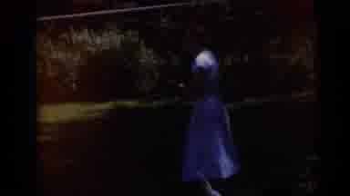 Camden New Jersey USA (1959): A Woman In A White Dress Turns And Walks Through A