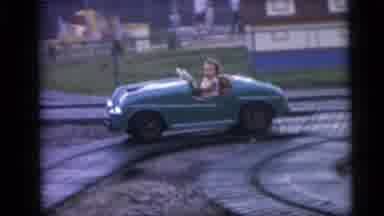 Camden New Jersey USA (1959): Little Girl In A Green Little Car Attached To Tracks