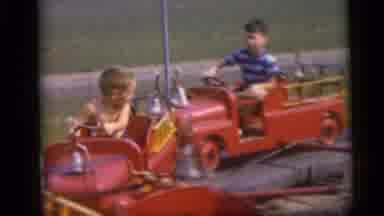 Camden New Jersey USA (1959): A Few Kids Ride An Amusement Park Ride That Is A