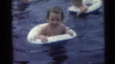 Camden New Jersey USA (1959): Little Kids Playing In Water As They Support