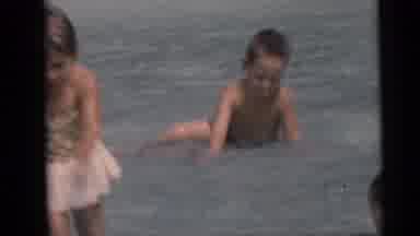 Camden New Jersey USA (1959): Young Brother And Sister Play In Shallow Water