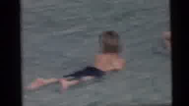 Camden New Jersey USA (1959): Two Young Boys In Swim Trunks Playing In Shallow