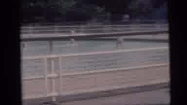 Camden New Jersey USA (1959): Boy Wearing Yellow Short Runs In Pool Water On A