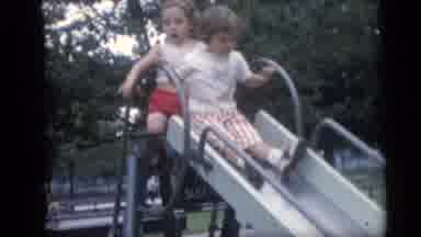 Camden New Jersey USA (1959): Clip Of Children Taking Turns Going Down A Slide At