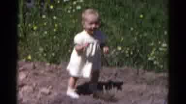 Catskill New York USA (1959): Toddler Girl Wearing A Dress Standing Outside In A