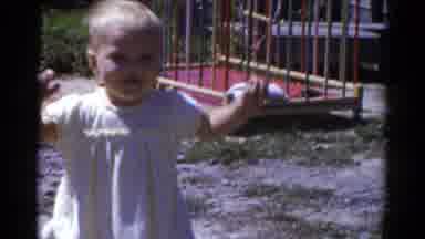 Catskill New York USA (1959): Baby Walking While Kids Are Playing Outside