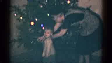Catskill New York USA (1959): Woman Helping A Small Child Decorate A Christmas