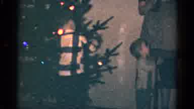 Catskill New York USA (1959): Boy Helps Decorate By Hanging Christmas Ornament On