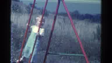 Catskill New York USA (1959): A Small Toddler Girl Swinging Back And Forth On A