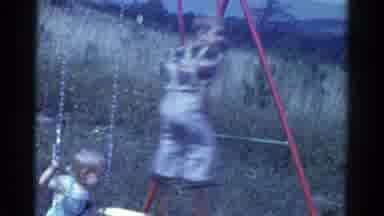 Catskill New York USA (1959): Older Sibling Playing Outside On The Playground
