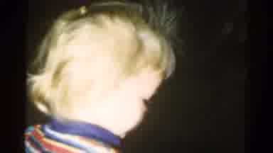 Catskill New York USA (1959): Small Child Back To Camera Turns Around Laughs And