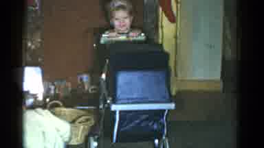 Catskill New York USA (1959): A Little Girl Pushes A Stroller While A Young Boy