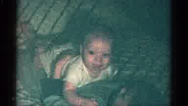 Catskill New York USA (1959): A Little Child Is Playing In The Bed They Enjoy