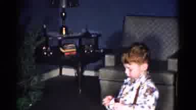 Catskill New York USA (1959): Little Boy With Red Hair In Suspenders Looking At An