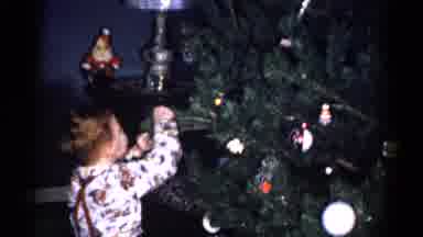 Catskill New York USA (1959): Boy Places Blue And White Ornament On Green