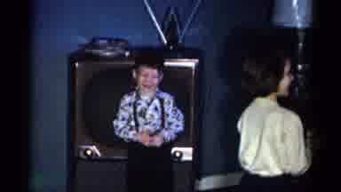 Catskill New York USA (1959): Child At Home Posing In Front Of The Tv With Other