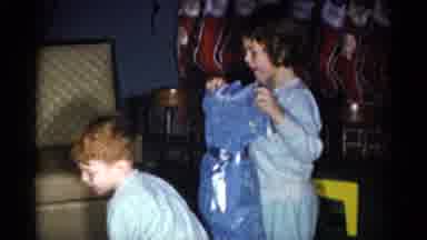 Catskill New York USA (1959): Christmas Morning Three Kids Opening Gifts Showing A
