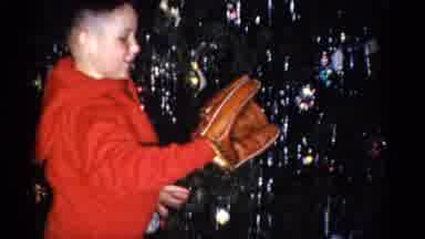 Catskill New York USA (1959): Boy Plays With His New Baseball Glove He Received As
