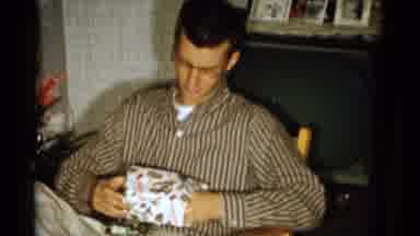 Catskill New York USA (1959): Bespectacled Young Man In Striped Shirt Opening