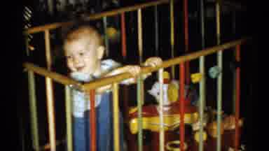 Catskill New York USA (1959): A Child Is Standing Inside On A Swing