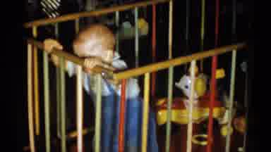 Catskill New York USA (1959): Child Plays In His Cradle With Great Joy Among His