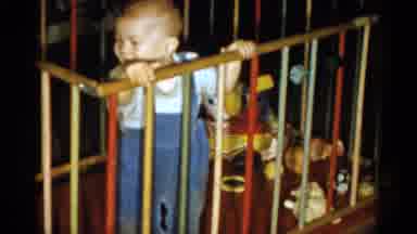Catskill New York USA (1959): Baby Happily Playing In His Playpen That Is
