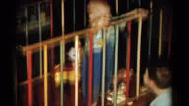 Catskill New York USA (1959): One Child Cradle In One Boy Are Playing At Home
