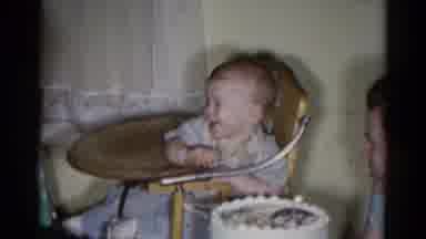 Catskill New York USA (1959): Smiling Child In High Chair Being Presented With