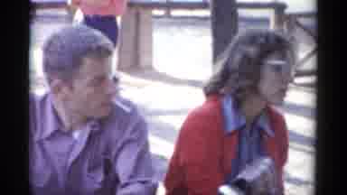 Catskill New York USA (1959): Child Holds And Eats Ice Cream While Parents Look On