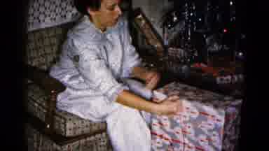 Hagerstown Maryland USA (1959): Husband And Wife Opening Gifts Christmas Day